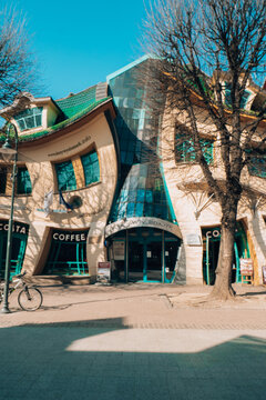 SOPOT POLAND - May 2022 Crooked house on the main Monte Cassino street in Sopot, Poland. Crooked little house Polish: Krzywy Domek is an unusually shaped building. Irregularly-shaped, one of fifty