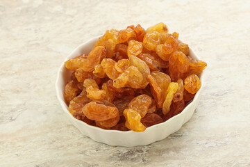 Sweet yellow raisin in the bowl