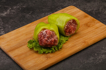 Raw stuffed pepper for cooking