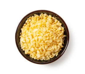 Tenkasu served in a bowl placed on a white background.