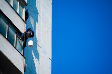 Climbers perform construction work