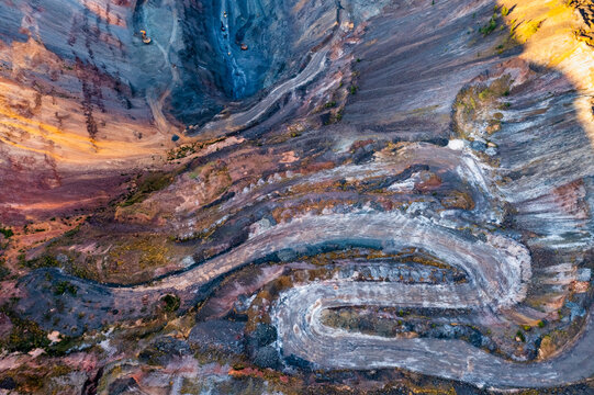Aerial view of an open pit of iron ore. Resource mining