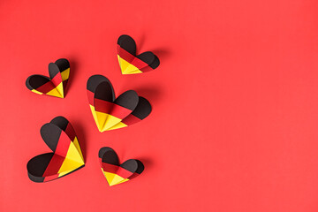 German style abstract background, hearts in the colors of the German flag
