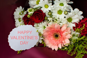 A bouquet of flowers and a valentine's day background.