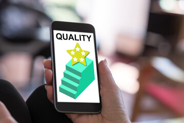 Quality concept on a smartphone