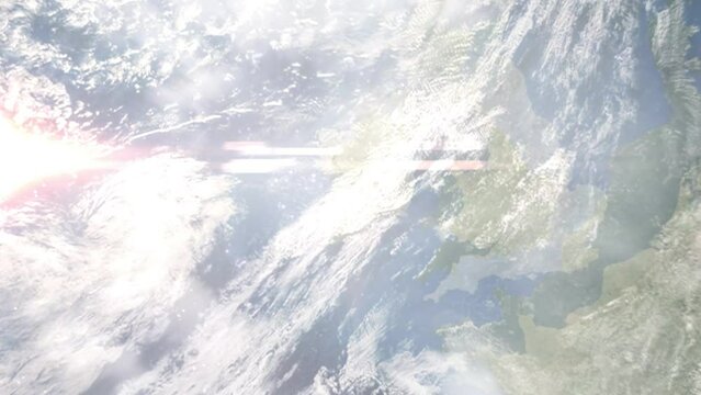 Earth zoom in from outer space to city. Zooming on Limerick, Ireland. The animation continues by zoom out through clouds and atmosphere into space. Images from NASA