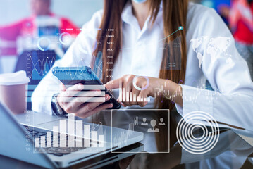 Team colleagues wear formal attire to work together to optimize business processes by using new technologies. high tech hologram in office