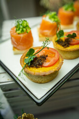 Mini snacks on the banquet table for a wedding