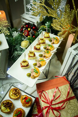 Fototapeta premium Mini snacks on the banquet table for a wedding