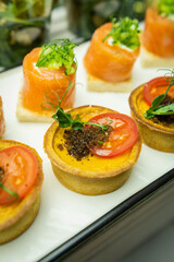 Mini snacks on the banquet table for a wedding
