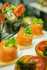 Mini snacks on the banquet table for a wedding