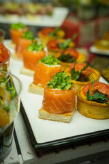 Mini snacks on the banquet table for a wedding
