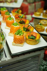 Mini snacks on the banquet table for a wedding