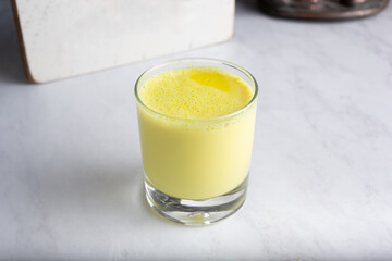A view of a turmeric latte or a turmeric lassi.