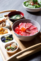 A view of a Japanese platter, featuring a nigiri and rice bowl.