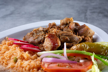 A view of a carnitas combo plate.