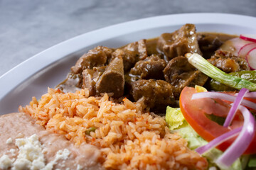 A closeup view of a plate of costillas de puerco.