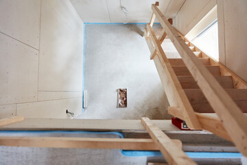 Temporary stairs on the construction site for a new house