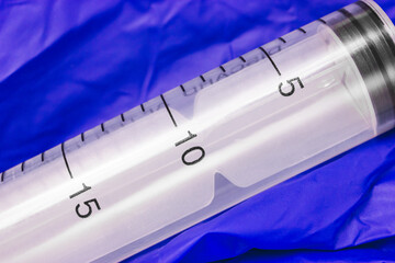 Measuring scale on a medical syringe. Disposable medical syringe.