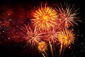 Naklejka premium HAPPY NEW YEAR 2023 - Celebration New Year's Eve, Silvester 2023 holiday background greeting card - Golden firework fireworks pyrotechnics on dark night sky