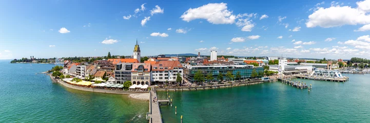 Fototapeten Friedrichshafen waterfront panorama with port harbor at lake Constance Bodensee travel traveling from above in Germany © Markus Mainka