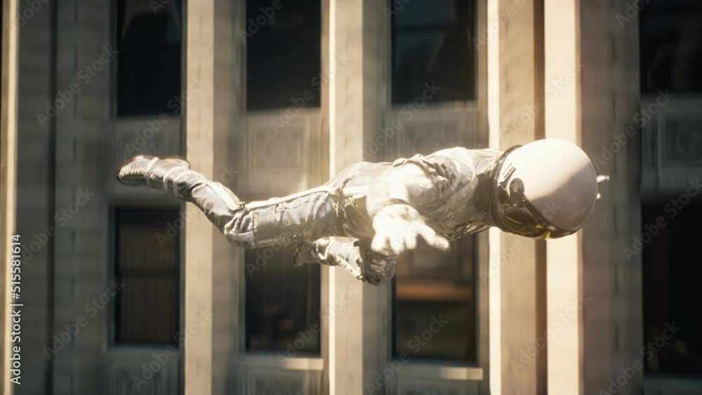 Wall mural a space traveler falls to the planet from space. astronaut's fall from space to earth. astronaut's f