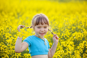 little child in a field of sunflowers