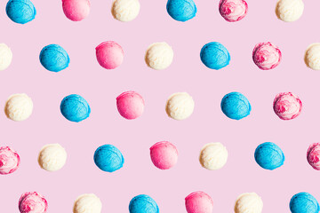 Pattern with colorful ice cream scoops on pink