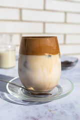 Coffee with ice. Dalgona coffee. Creamy coffee with ice and almond milk. Ideal drink for summer