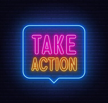 Take Action neon sign in the speech bubble on brick wall background ..