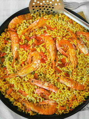Spanish seafood fideua. Spanish seafood Noodle Paella. Typical and summery dish from the Gandia, Valencia, Spain