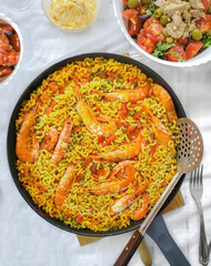 Spanish seafood fideua. Spanish seafood Noodle Paella. Typical and summery dish from the Gandia, Valencia, Spain