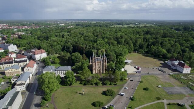 Schlosskirche church in Neustrelitz, Germany. Drone footage of a town.