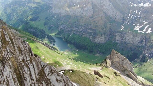 Aerial shot of Seealpsee lake in the Alpstein range, Appenzell Alps, Switzerland