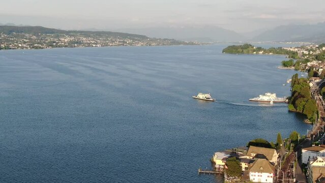 Aerial shot of a ferry on Zurichsee lake in Switzerland