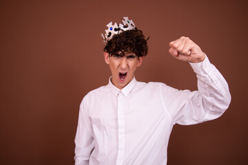 Funny man in a silver crown.	
