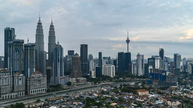 Timelapse 4k UHD footage of cityscape of Kuala Lumpur and moving cloud