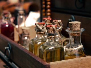 small bottles of tinctures, medicines or scented oils on the counter