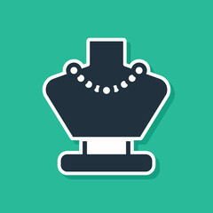 Blue Necklace on mannequin icon isolated on green background. Vector