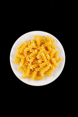 Pasta in  plate with black background