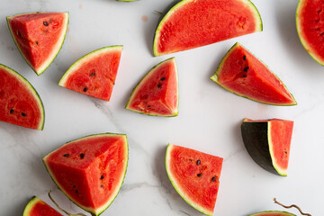 Green watermelon  sliced pieces summer concept top view food background