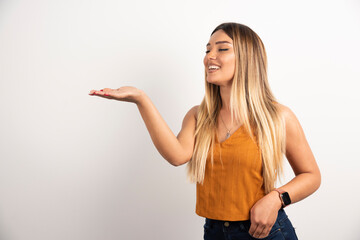 Pretty woman posing on white background