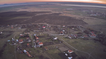 Aerial photography from a drone. View of the fields and the village from a height panoramic view