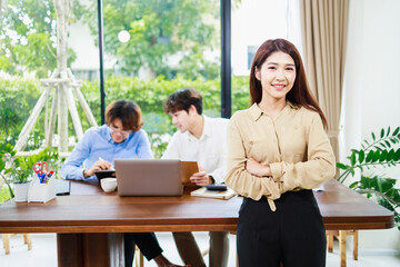 Portrait of Attractive Asian businesswoman working with team at home. Small business and Teamwork