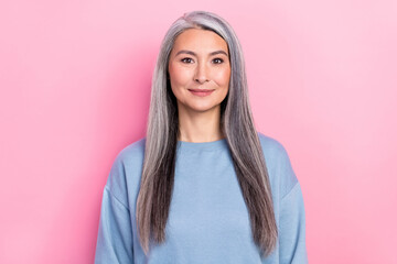 Photo of charming shiny retired woman blue sweater smiling isolated pink color background