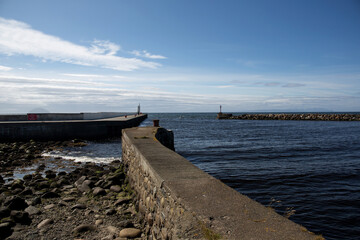 Fototapeta na wymiar Entrance to Girvan Harbour in South West Scotland
