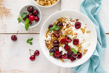 Sour cherry granola with cottage cheese and yogurt. Healthy food, diet breakfast
