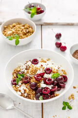 Sour cherry granola with cottage cheese and yogurt. Healthy food, diet breakfast