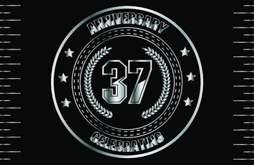 37th silver anniversary logo with ring. Silver anniversary laurel wreath.