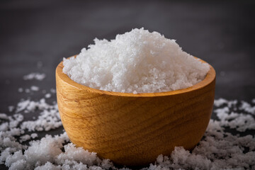 Fototapeta na wymiar Salt in a wooden bowl
